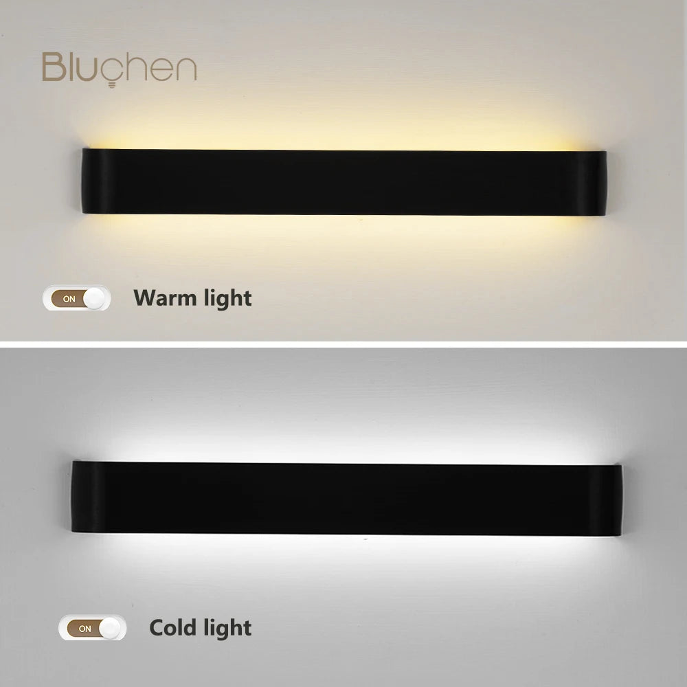 aluminum wall sconce, installed in a room interior setting