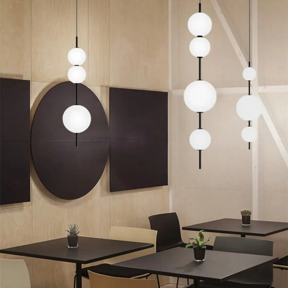Three ball glass chandelier standing 80 centimetres high, LED included