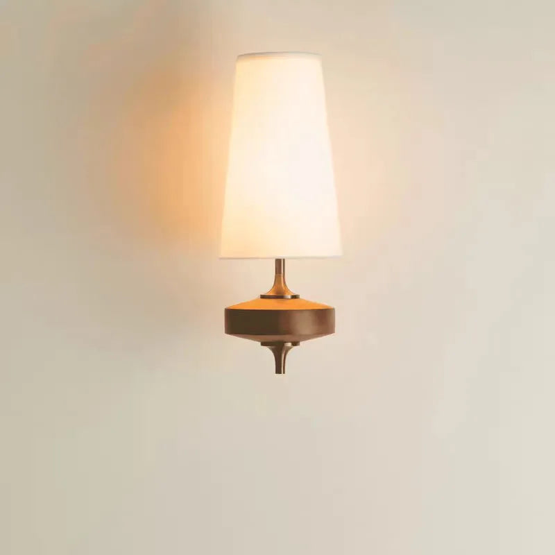 fabric shade wall sconce, installed in a room interior setting