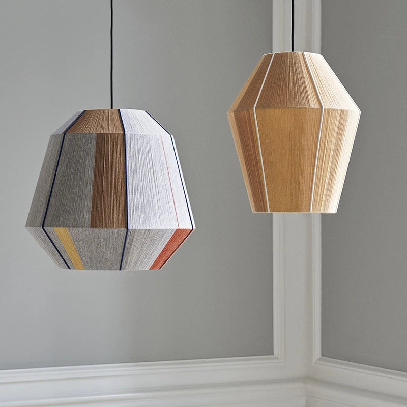 Rattan chandelier scattering a soft shadow pattern through its weave