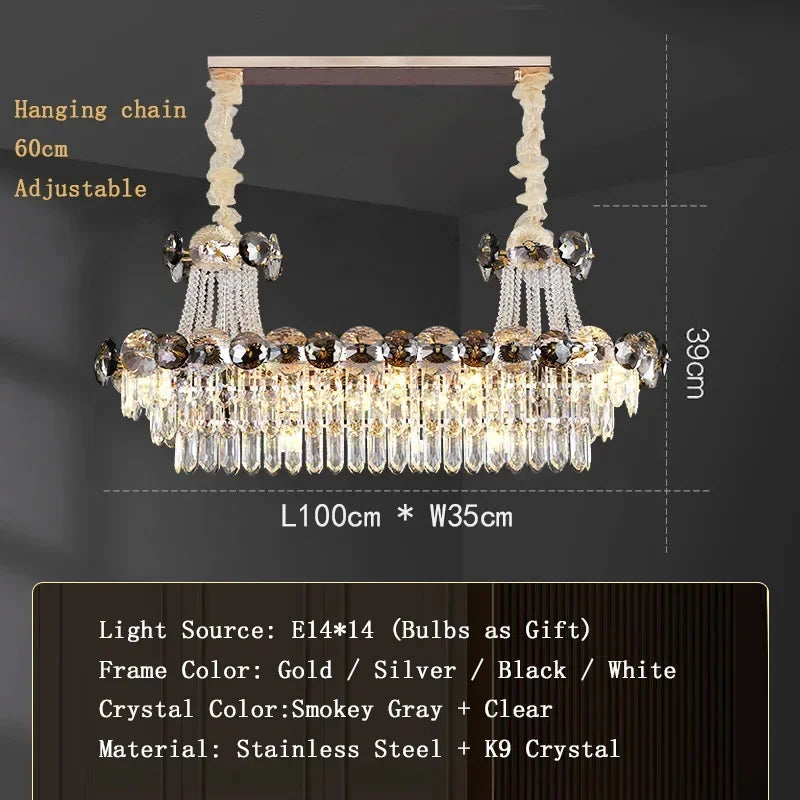Classical gold crystal chandelier shown lit in warm white light