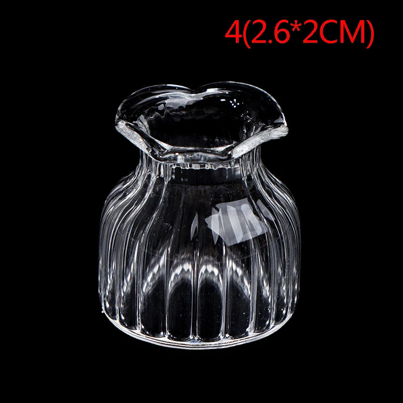 Style three miniature glass vase shown with small decorative flowers