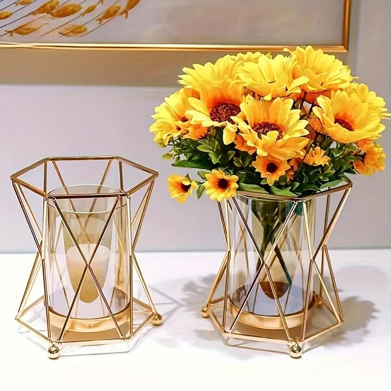 Close-up of gold wrought iron geometric frame with inset glass hydroponic vessel