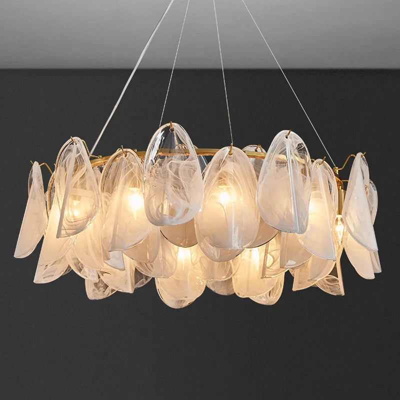 Luxury gold glass chandelier with clear shades on an iron frame