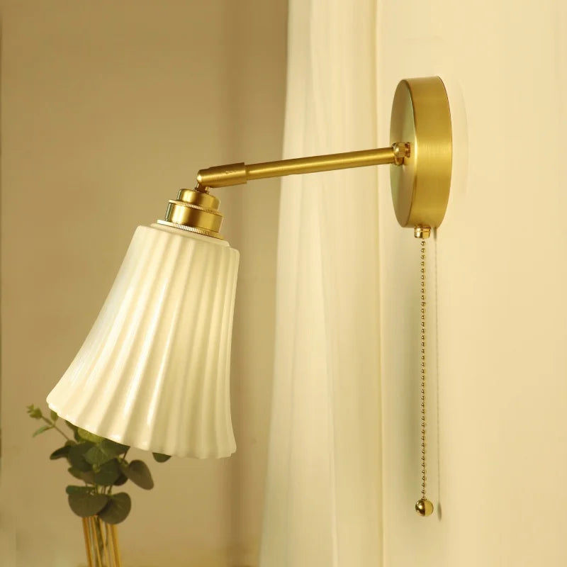 brass wall sconce, side profile showing mounting depth
