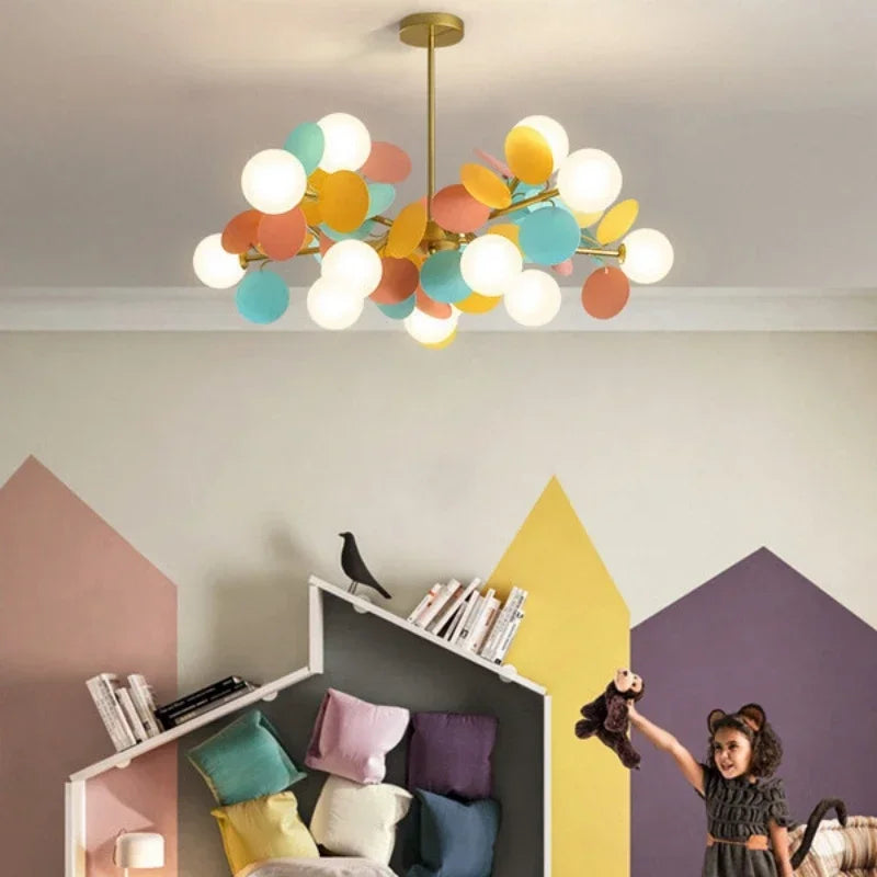 Colorful flower branch chandelier with painted metal arms and globe shades