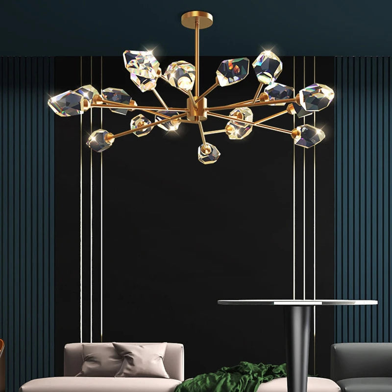 Gold finish linear chandelier holding rows of clear crystal on a slim metal frame