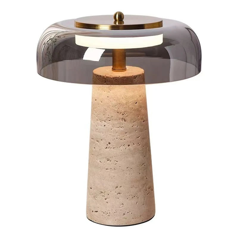 Glass mushroom cap diffuser close-up warm light through shade