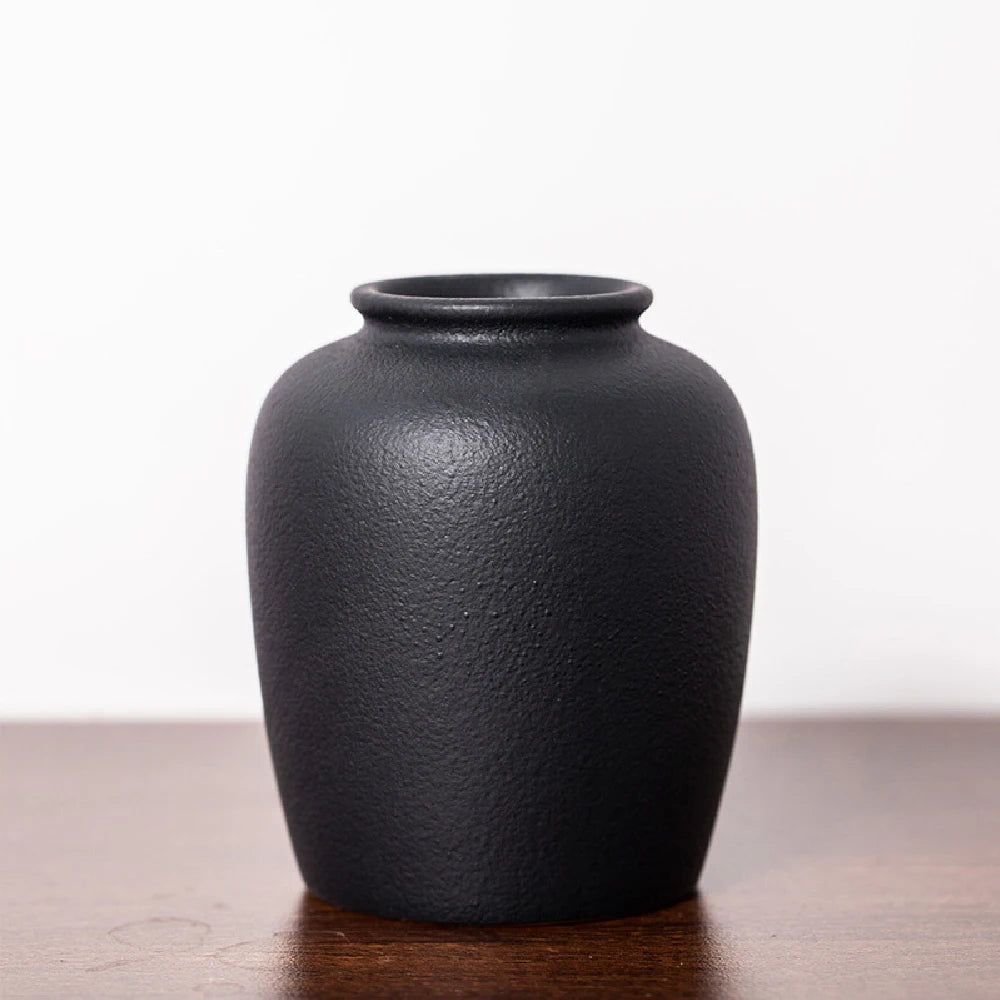 Ceramic matte frosted vase style E styled on a bathroom shelf as a minimal accent