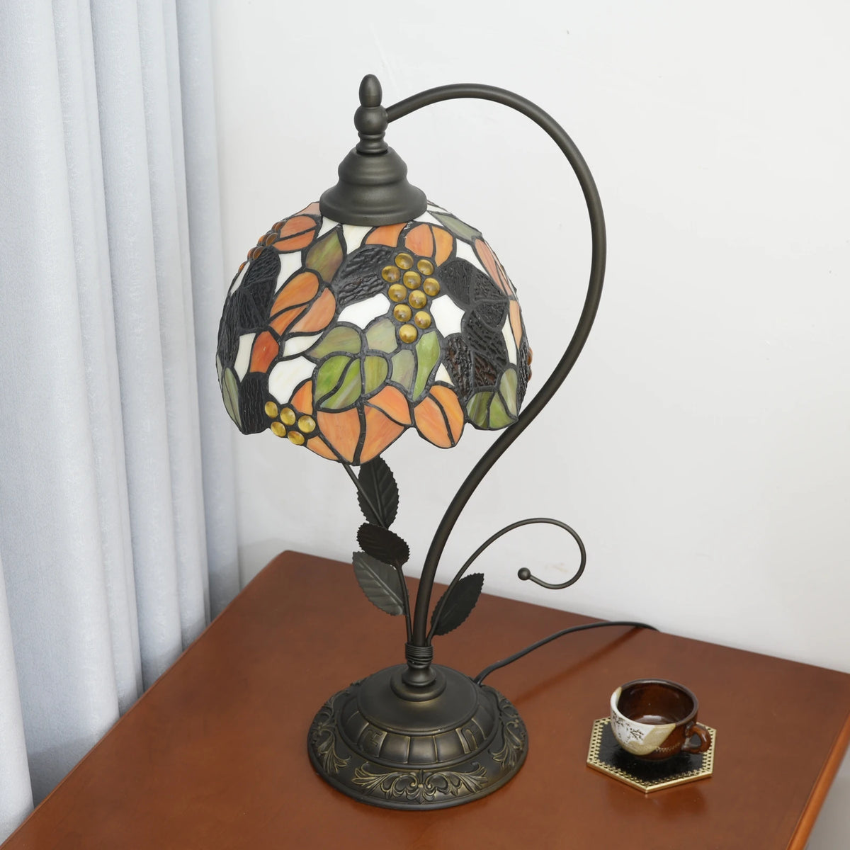 Stained glass leaf lamp hand-assembled panels close-up material detail