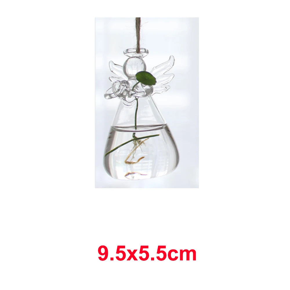 Angel glass hanging vase with hydroponic plant cutting displayed near window