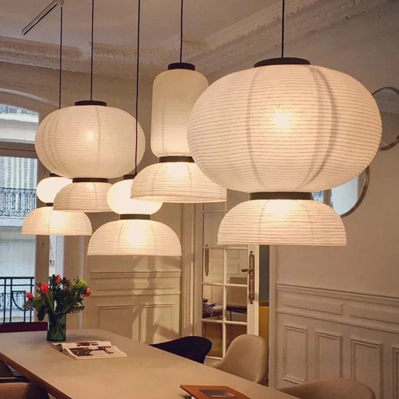 Wabi sabi rice paper chandelier with a rounded shade on polished chrome