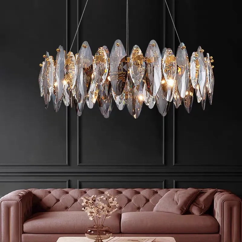 Clear crystal modern chandelier on a plated aluminum ceiling frame