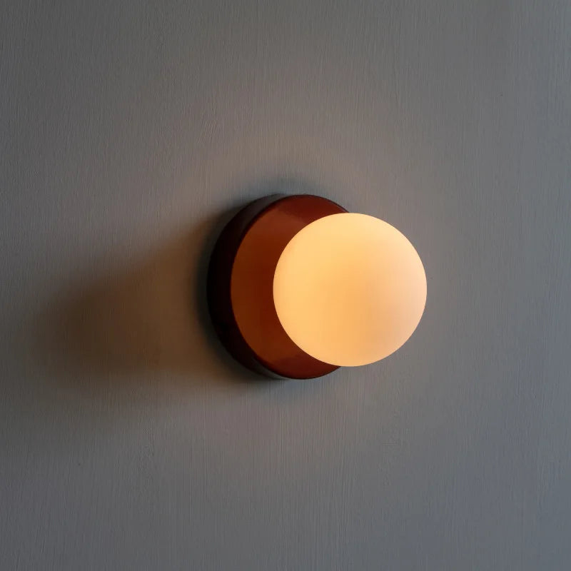 glass outdoor wall sconce, side profile showing mounting depth