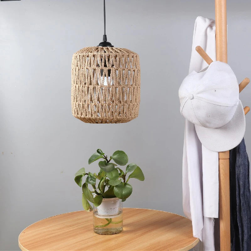 Beige wicker chandelier shade tempering an overhead bulb