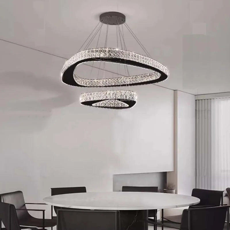 Three ring crystal chandelier, 27.6 in across, in silver steel