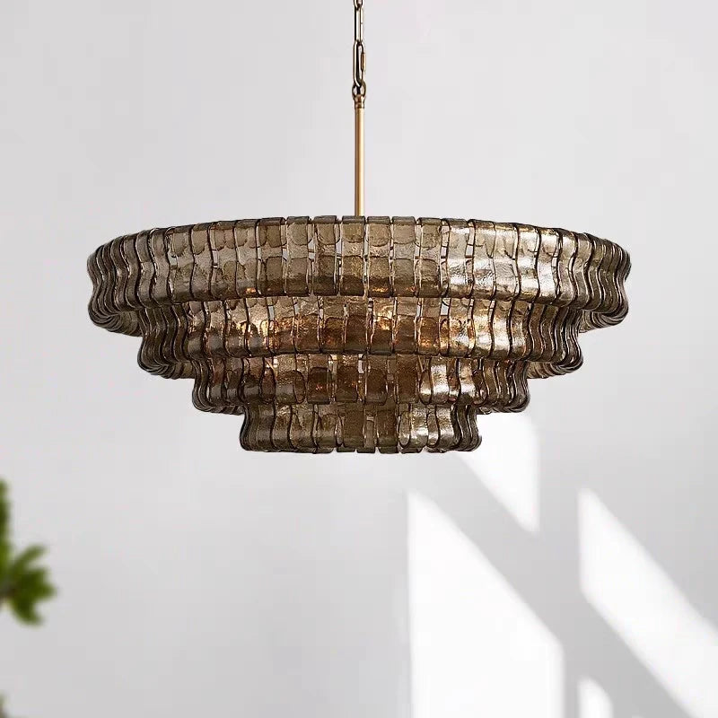 Clear glass chandelier at 35.4 in across on a gold stainless frame
