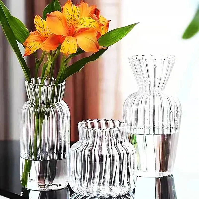 Nordic transparent glass bottle vase in small size on Scandinavian home desk