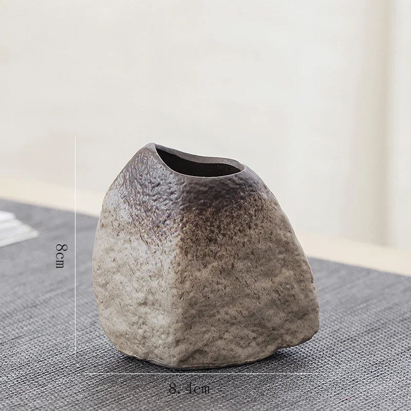 Group display of five retro Chinese ceramic pottery vase styles together