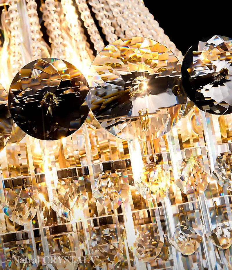 Round gold crystal chandelier measuring 39.4 in (100 cm) wide