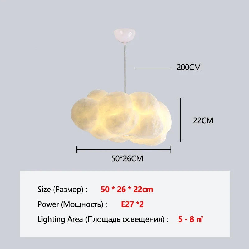 Soft sculptural cloud pendant at 31.5 in long in tricolor light