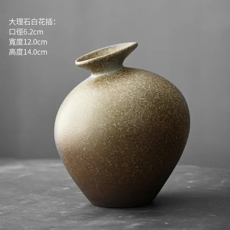 Japanese black terracotta abstract vase in side profile view