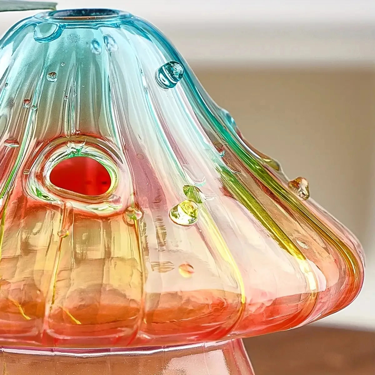 Boho glass mushroom vase as hydroponic planter with cutting inside