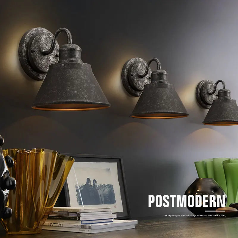iron outdoor wall sconce, installed in a room interior setting