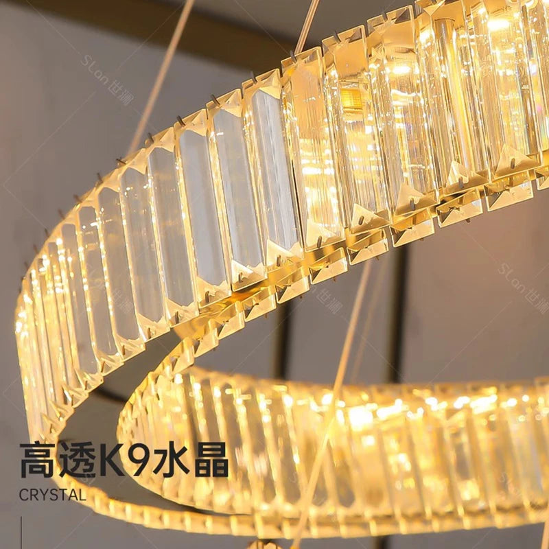 Silvery concentric crystal chandelier on adjustable cord pendants