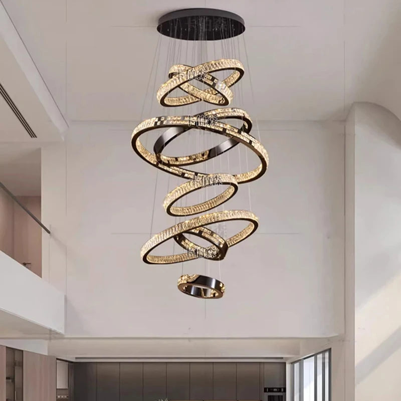 Tiered crystal stair chandelier with six rings on an ironwork frame