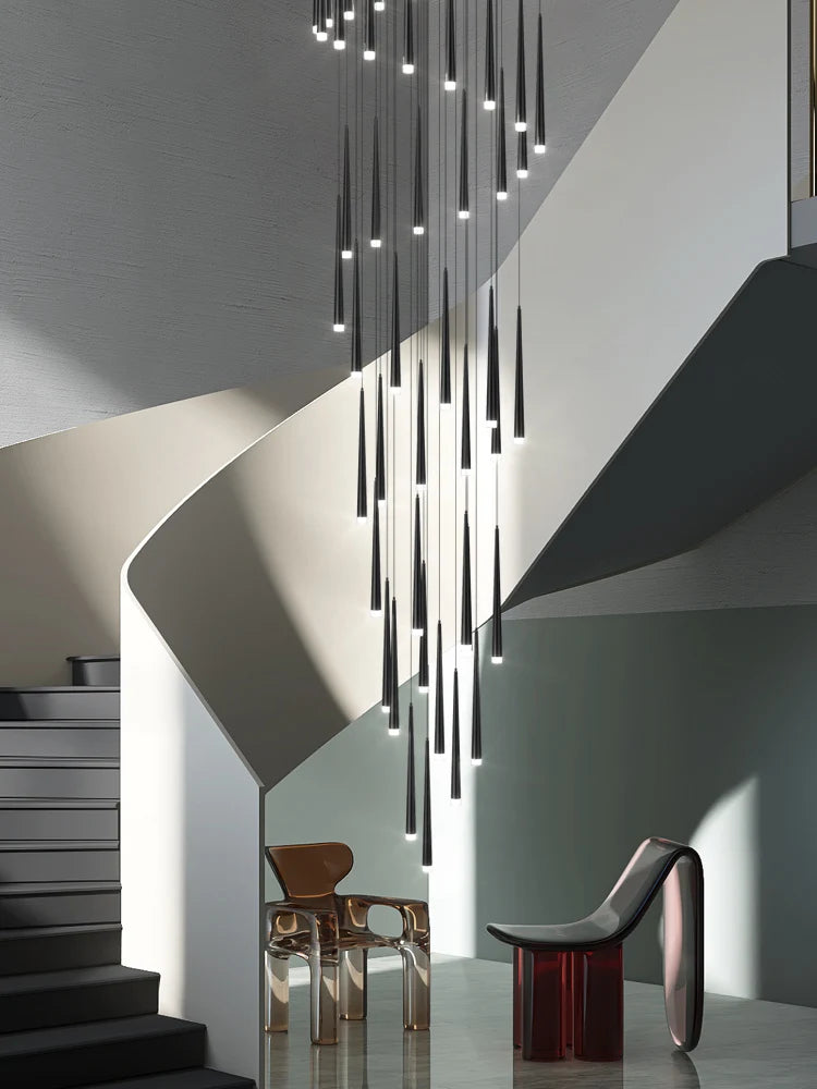 Long aluminum stair chandelier with slim heads on adjustable cords
