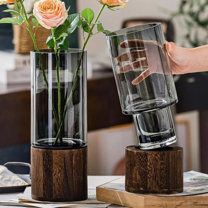Glass bud vase Style A with natural wooden base on Japandi dining table