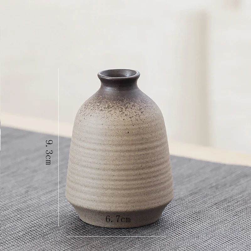 Product flat lay of all styles E through I Chinese retro ceramic vases
