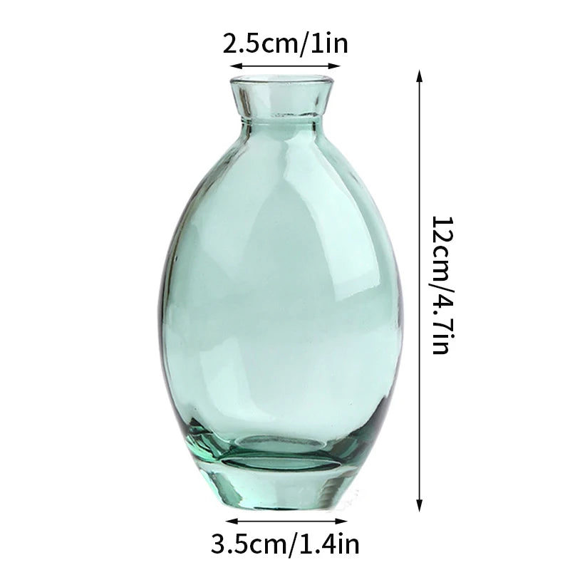 Retro glass vase with flower arrangement on dining table