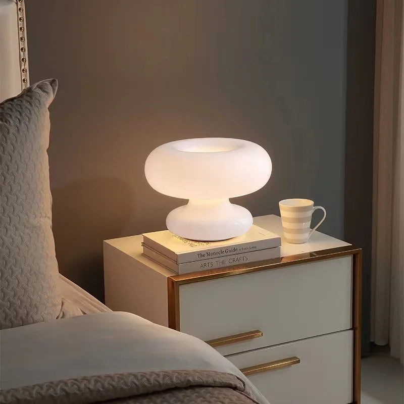 Art Deco glass table lamp body showing sculptural glass layers and light diffusion, front view