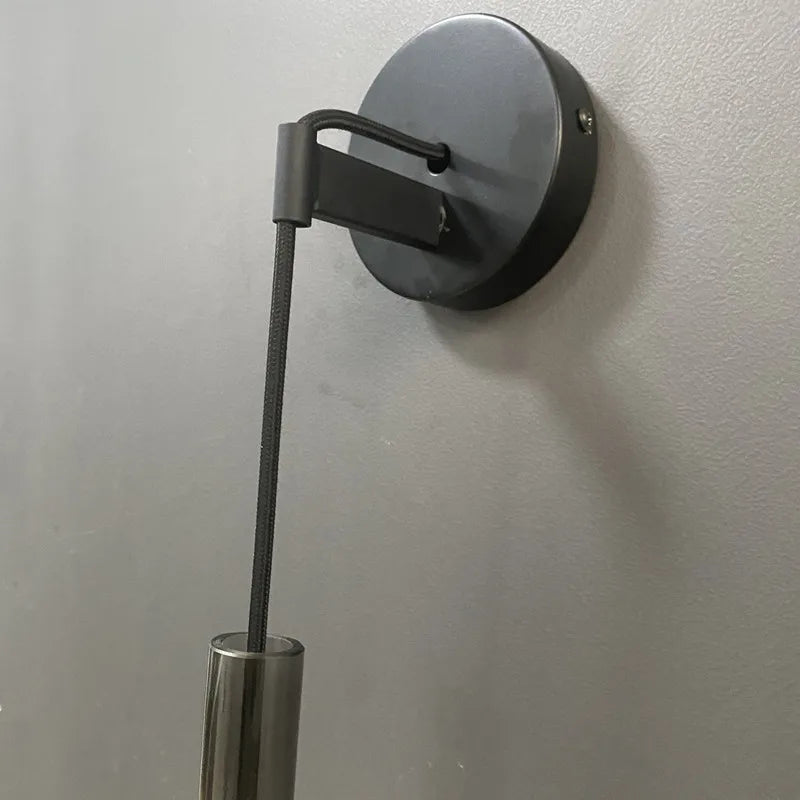 glass wall sconce, close-up of shade and hardware detail