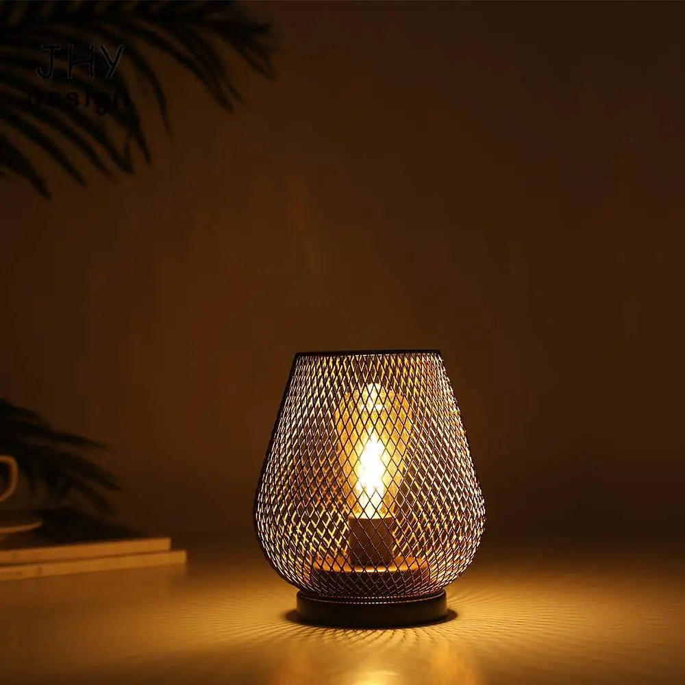 Metal egg cage table lamp front view showing woven metal mesh design