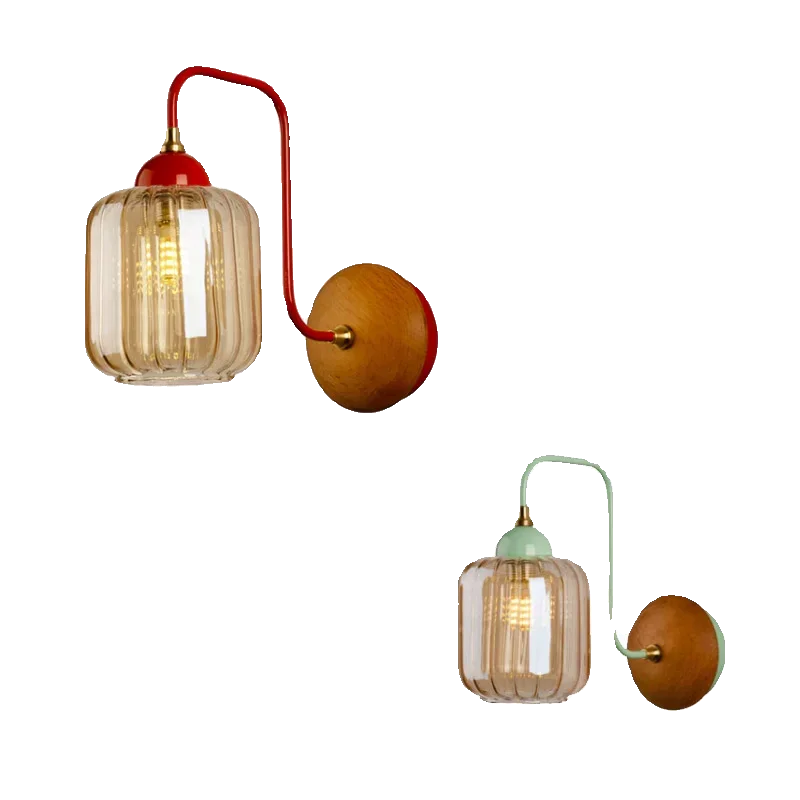 amber glass wall sconce, detail view of fixture base and arm