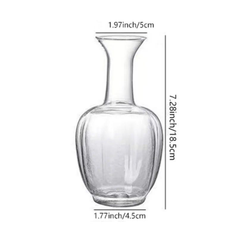 Macro detail of cylindrical glass vase base showing full transparent clarity