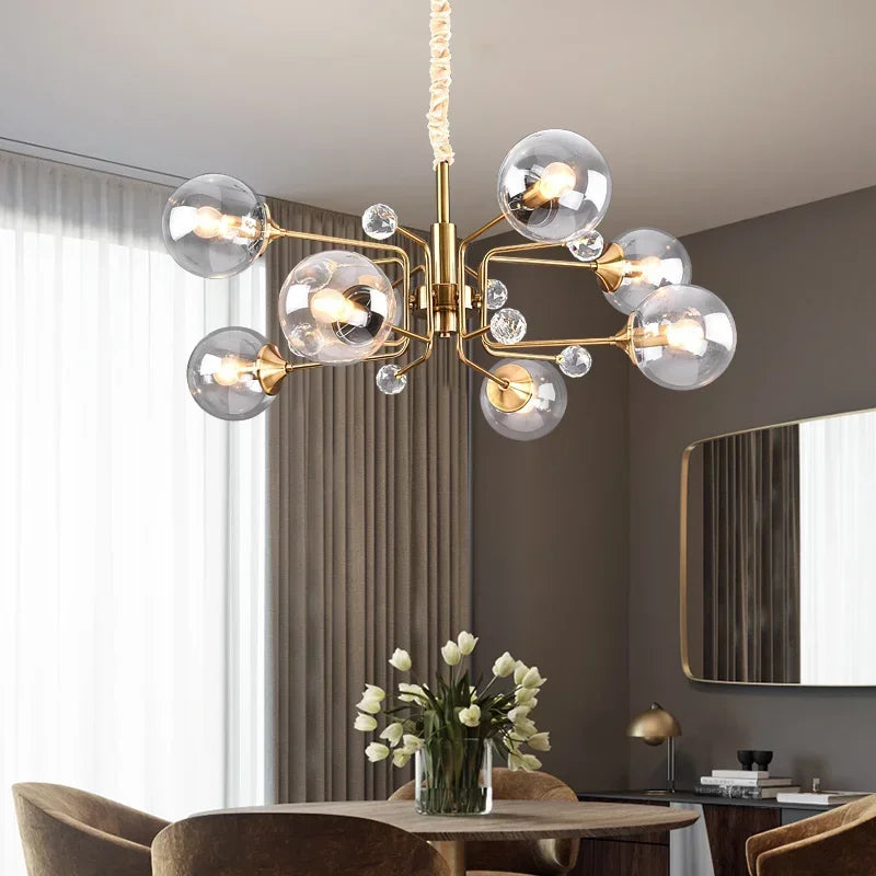 Downward facing glass bubble chandelier with clear globes and E14 LED bulbs