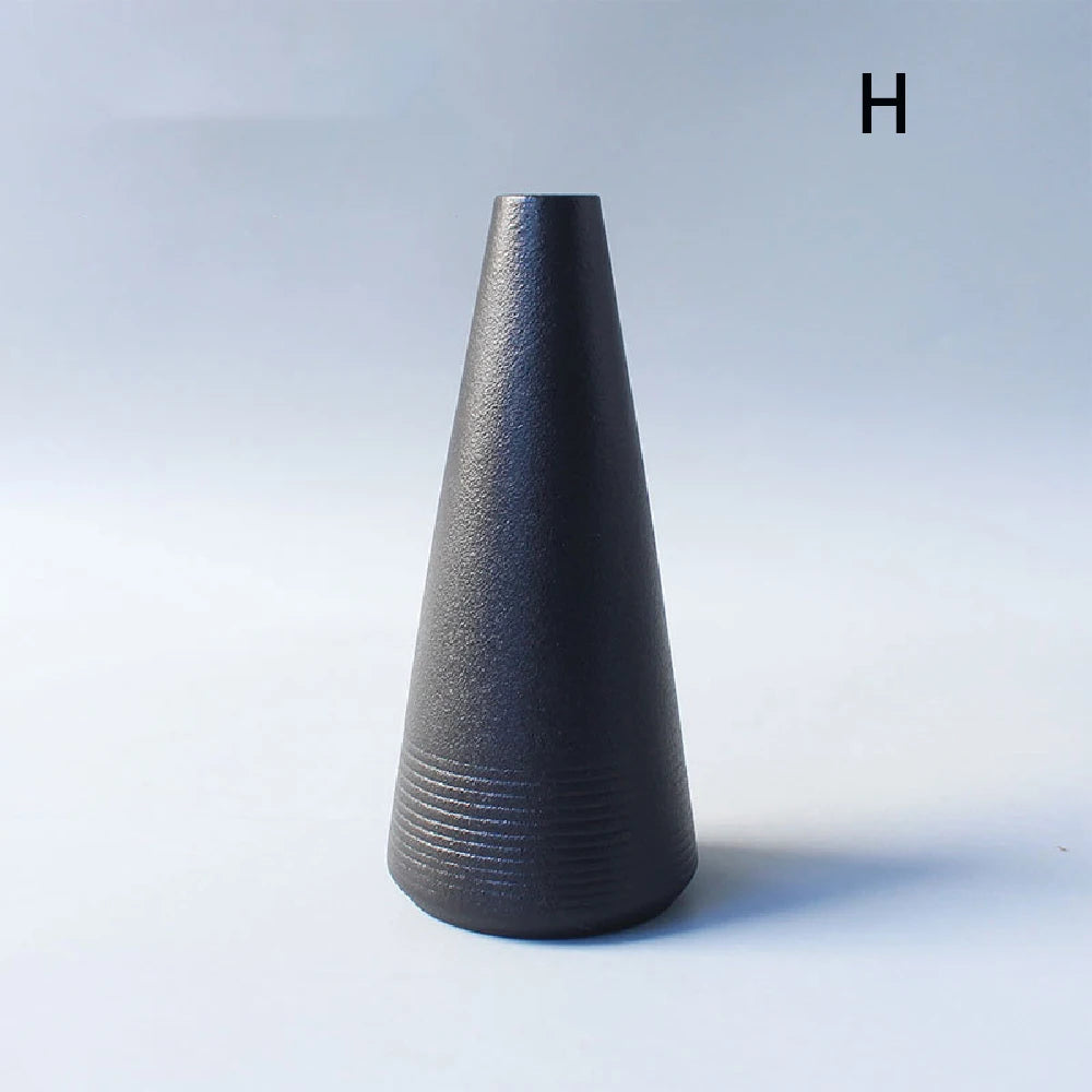 Collection of style 02-variants Japanese ceramic vases displayed together