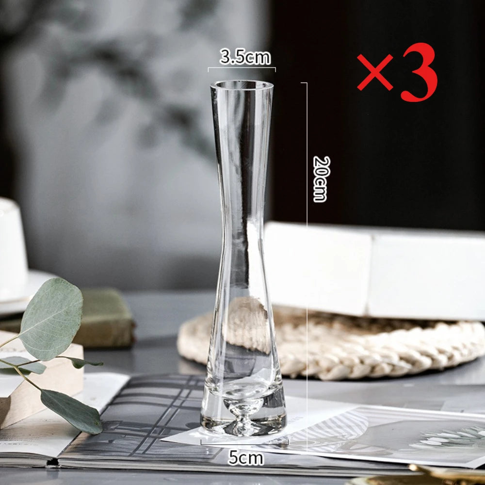 Small style B glass vase with slanted mouth holding single pink peony