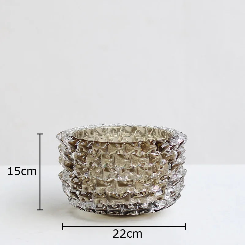 Wrinkled glass decorative vase on marble console table
