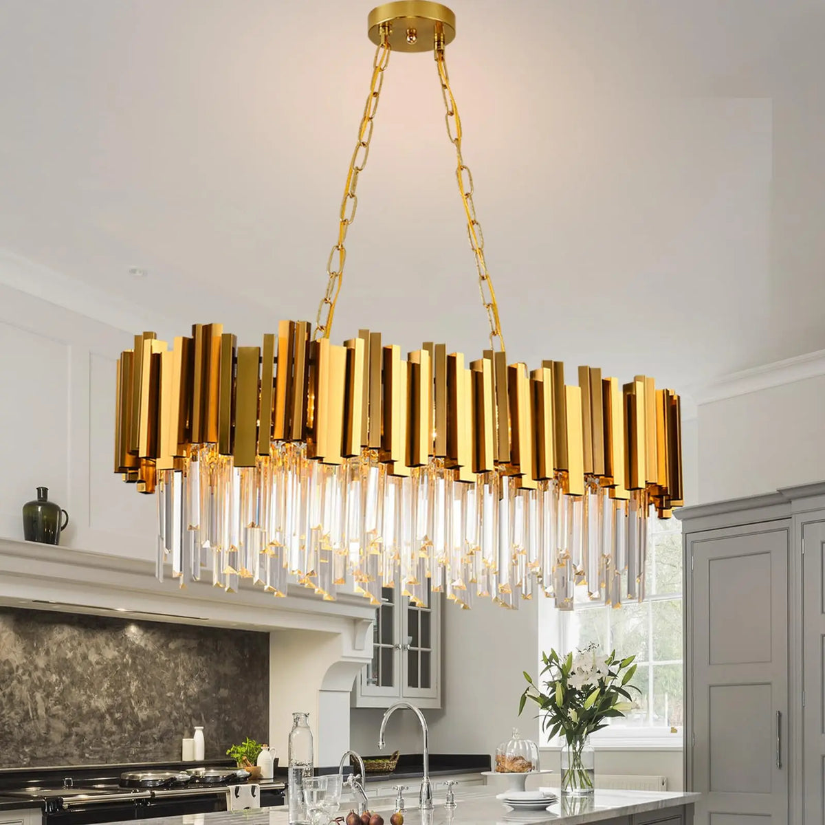 Gold oval crystal chandelier with K9 crystal on a polished iron frame