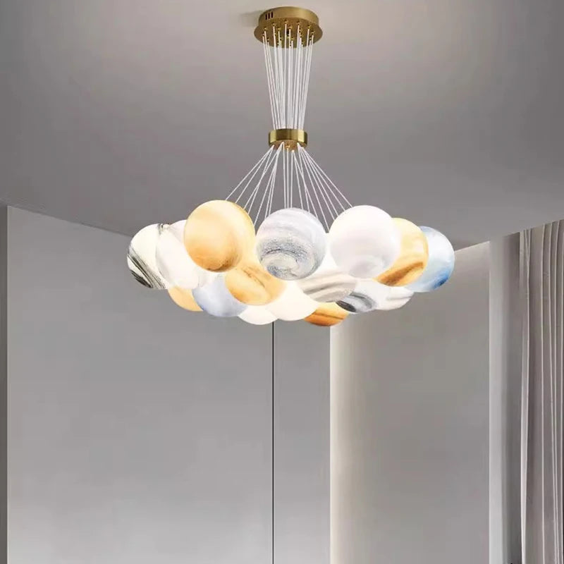 Acrylic chandelier at 29.5 in diameter with nineteen lit heads