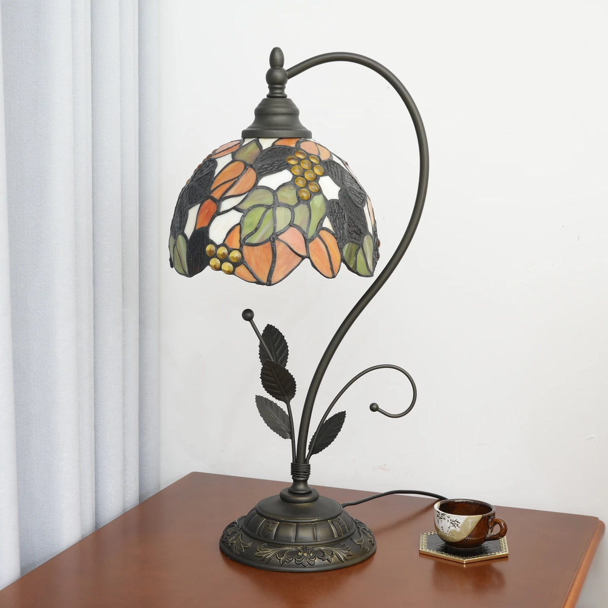 Sakura blossom stained glass lamp pink petals illuminated warm