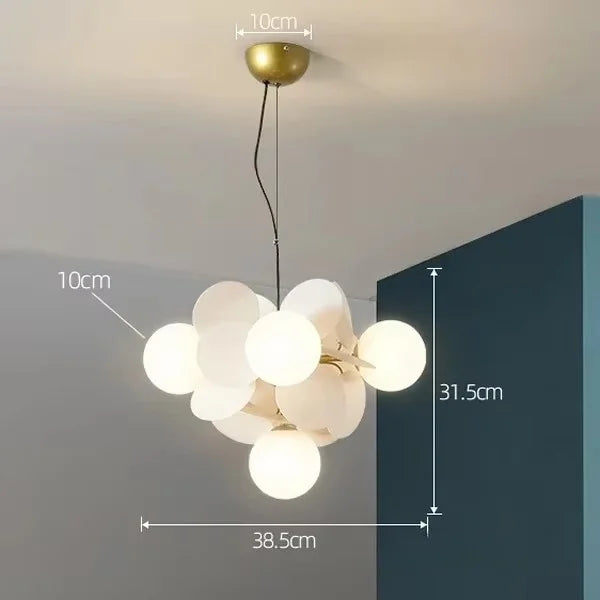 Flower branch chandelier shown lit in warm white 3000K light