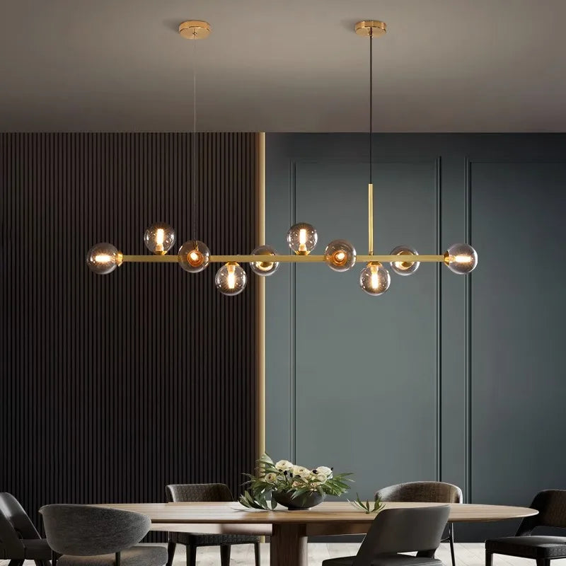 Iron bar canopy detail on a modern linear chandelier in white finish