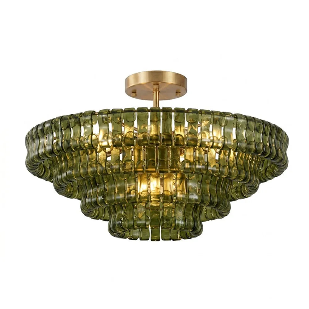 Clear glass chandelier shades on a semi-flush mounted iron frame in gold