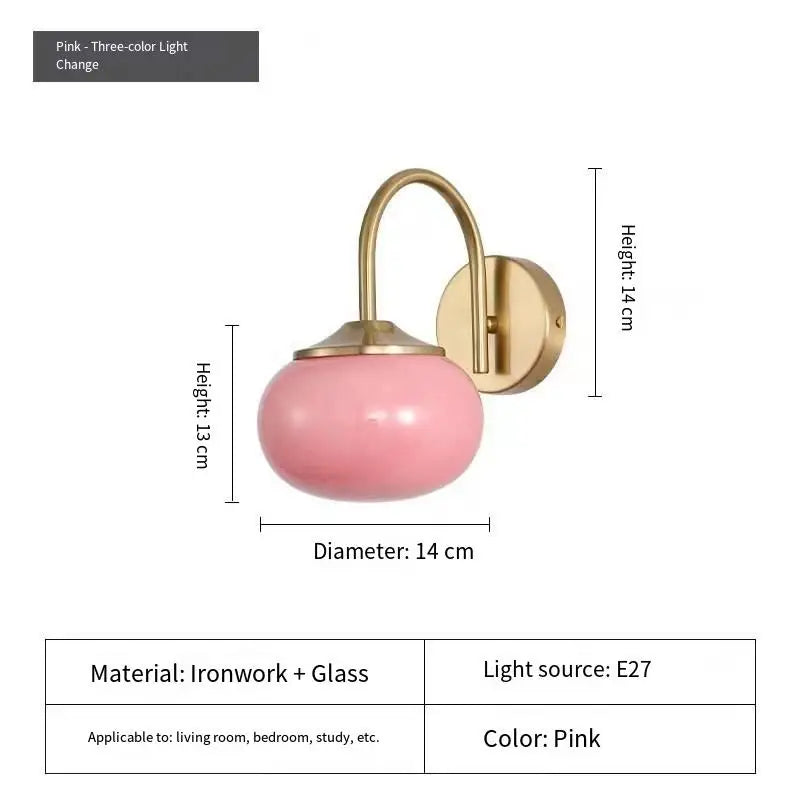 Three head frosted glass chandelier in pink with gold toned arms